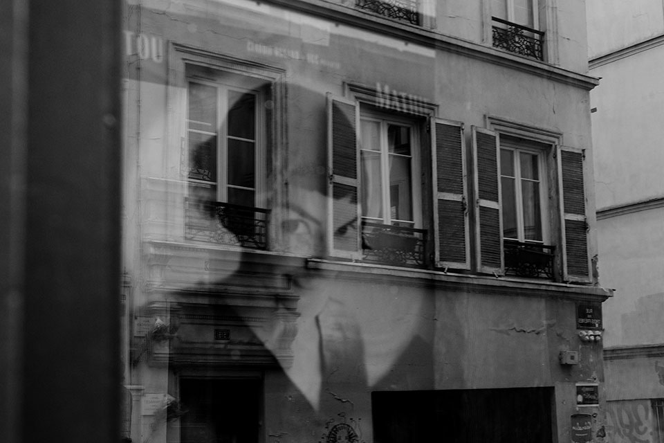 Paris shop window reflection