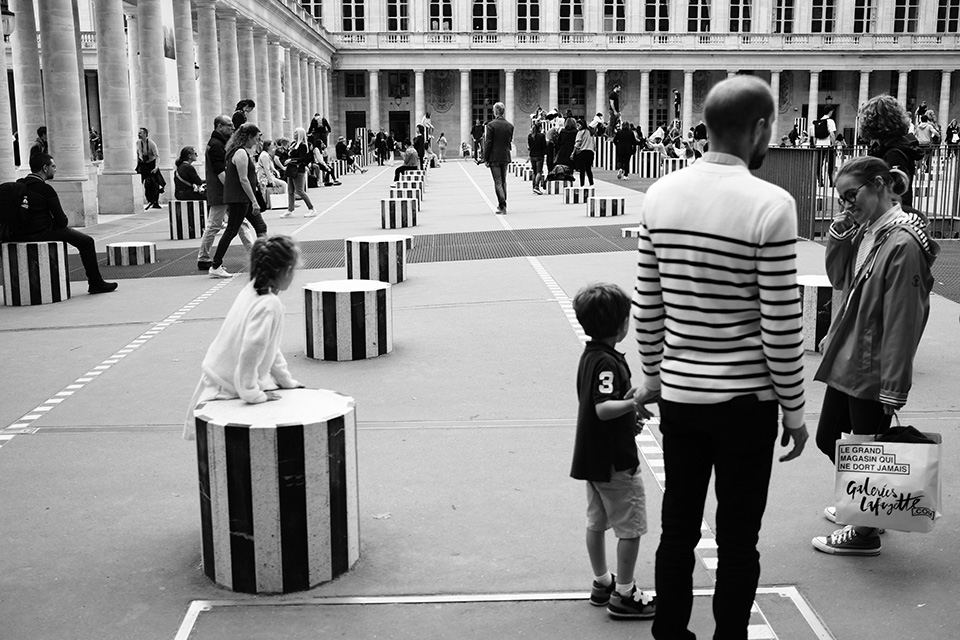 Photograph people as part of their surroundings