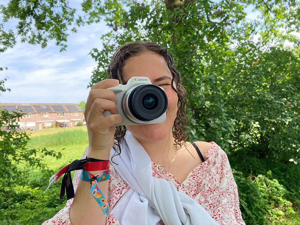 Canon eos r50 holding 2