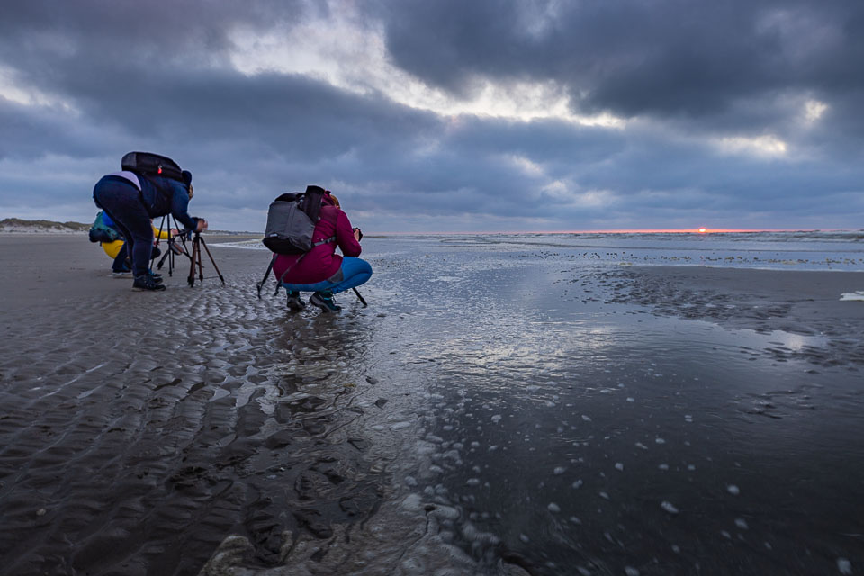 Nando on the beach with a tripod Nando on the beach with a tripod