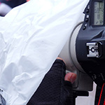 Sport photography tip: Rain cover for camera and lens