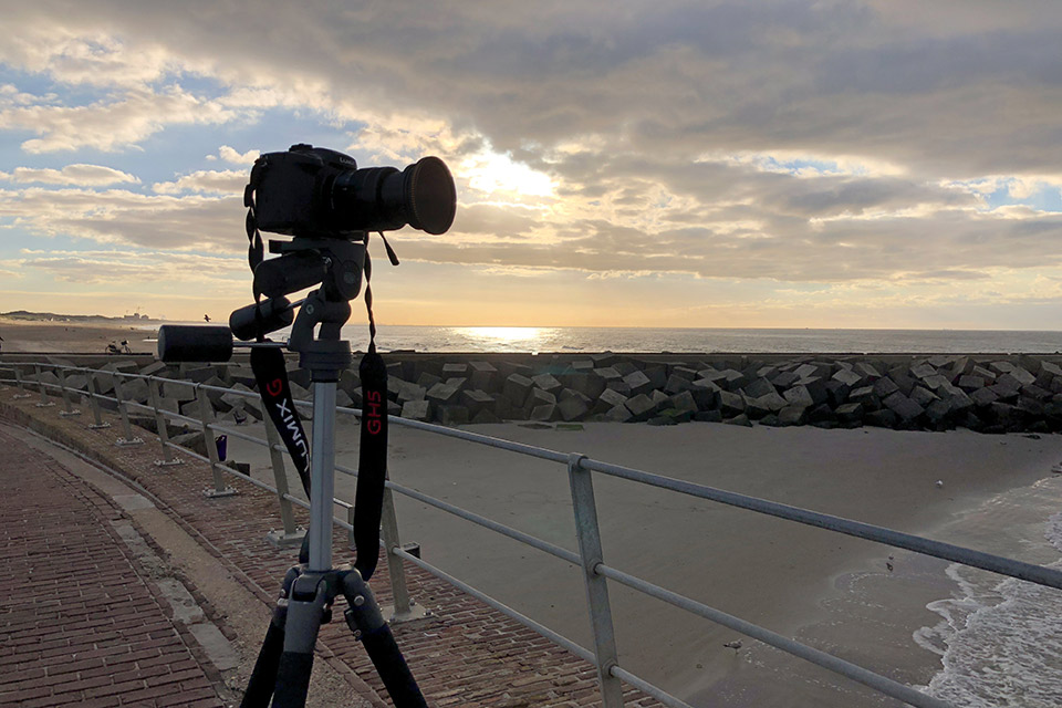 Make sure you use a sturdy tripod to prevent camera shake. Also remove the 'windsock' (the neck strap) before you begin.